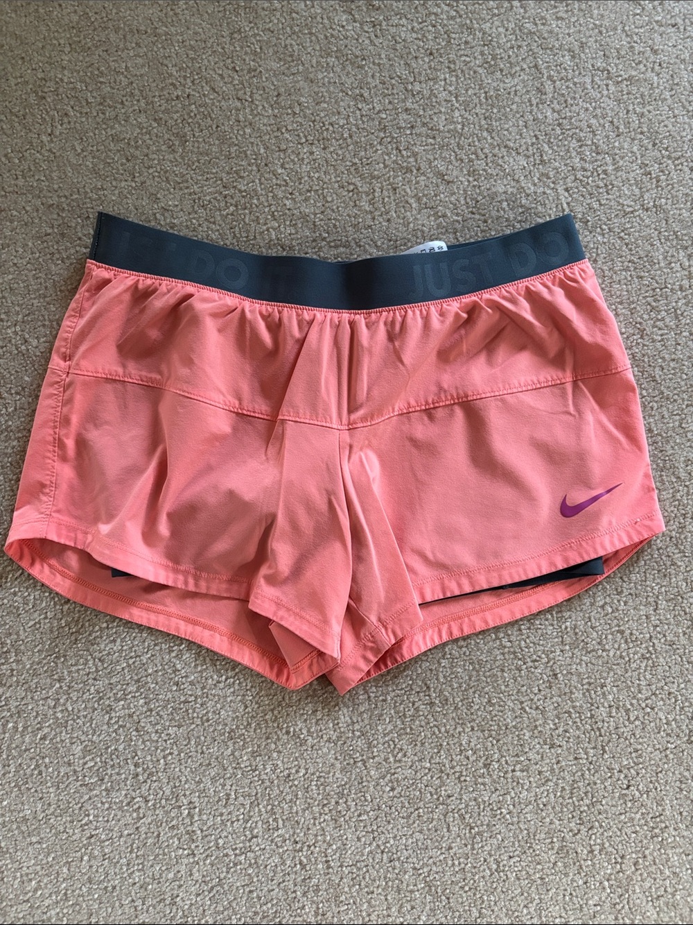 Nike Women's Coral Pink Athletic Shorts with grey Waistband